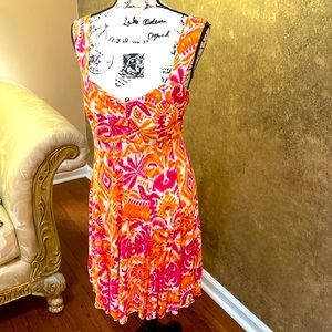 Flirty bright summer dress by Peppermint Bay L slightly asymmetrical hemline